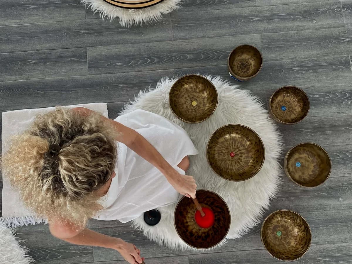 Tibetan bowls and sound instruments arranged for a Sound+Vibrations session.